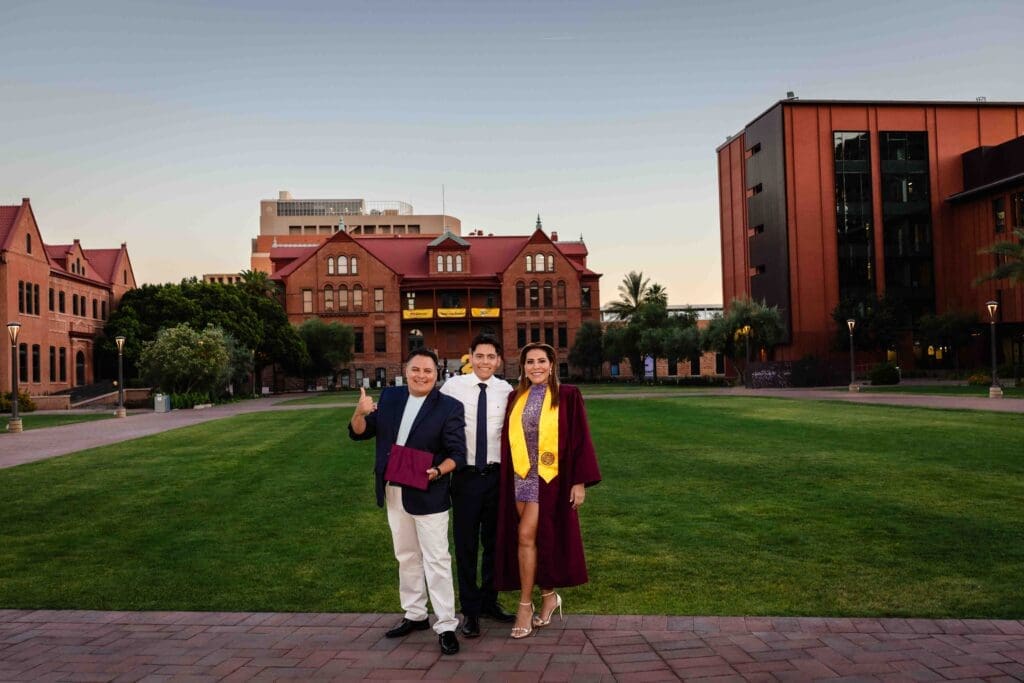 ASU graduation family photo on the lawn near Old Main